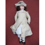 An Early XX Century Bisque Headed Doll, head stamped 14. Fixed eyes, open mouth with teeth, 73cm