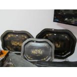 A Set of Three XIX Century Graduated Black Lacquer Papier Mache Trays, with wavy border and gilt