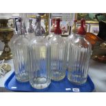 Seven Mid XX Century Etched Advertising Soda Syphons, three with chrome dispensers.