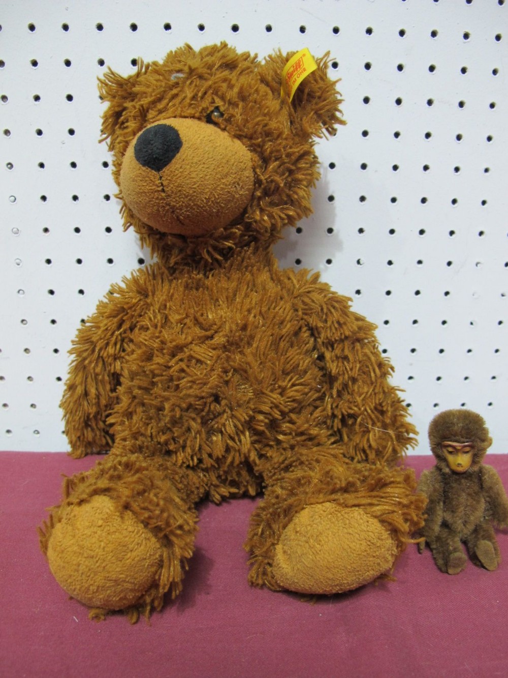 An Original Mohair Schuco Monkey, approximately 8.5cm high, jointed head, arms and legs, plus a