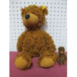 An Original Mohair Schuco Monkey, approximately 8.5cm high, jointed head, arms and legs, plus a