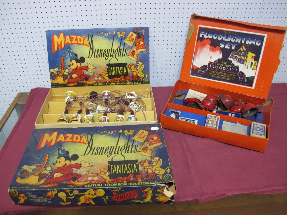 A Set of Mazda Disney Fantasia Lights, boxed, and a BGL toy theatre floodlight set, boxed.