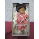 A Sasha Brunette Female Doll, 30cm tall.