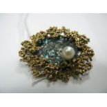 A 9ct Gold Shell and Pearl Brooch, of stylised textured design.