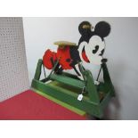 A Mid XX Century Child's Rocking Horse, in the style of Mickey Mouse, 80cm long, 70cm high, some