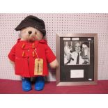 A Gabrielle Paddington Bear, circa 1980, red duffle coat, blue boots, brown felt hat, Darkest Peru