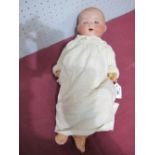 A 1st Half XX Century Bisque Headed Baby Doll by Armand Marseilles, head stamped 351/4K fixed