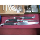 A Hallmarked Silver Mounted Three Piece Carving Set, each with reeded tapering handle, knife blade