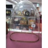 A XIX Century Glass Dome, of oval form, 34cm high 31cm wide.