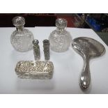 A Pair of Hallmarked Silver Mounted Cut Glass Scent Bottles, each of globular form with internal