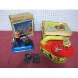 A Mid XX Century Child's 'Pixie Phone', by Gama and a little Betty sewing machine, both boxed.