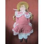 An Early XX Century Bisque Headed Doll by Walter Goebaus of Germany, sleepy eyes, open mouth with