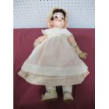 An Early XX Century Bisque Headed Doll By Armand Marseilles of Germany, head stamped 390N, DRGM