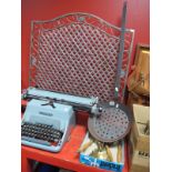A Cast Metal Firescreen, with red glass drops and glass candle holders, chestnut roasting pan, brass