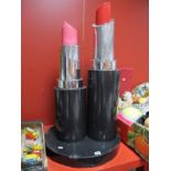 A Large Modern Shop Display, formed as two lipsticks, height 89cm.