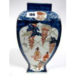 A Late XIX Century Japanese Pottery Vase, of shaped square form, painted in panels with figures