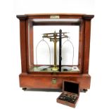 Early XX Century L. Oertling Ltd. Chemical Balance Beam Scales, in a glazed mahogany case, bears