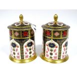 A Pair of Royal Crown Derby Porcelain Old Imari 1128 Tea Caddies and Covers, with acorn finials,