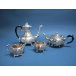 An Electroplate on Copper Four Piece Tea Set, each of circular form detailed with flowerheads and