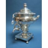 A Plated Samovar, with twin handles and gadrooned edge, the square base with concealed burner, on