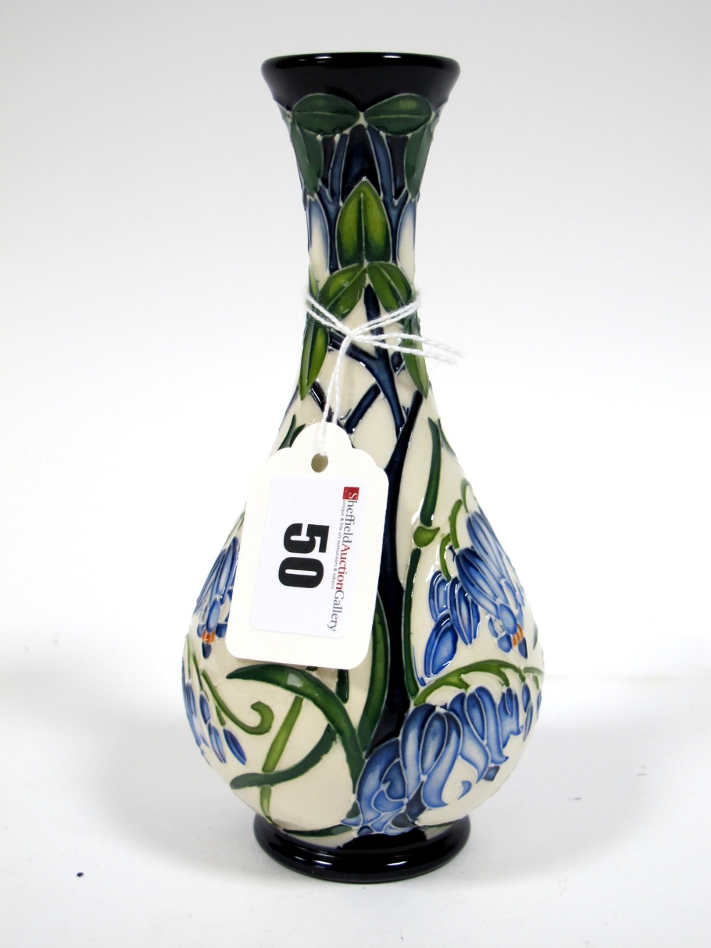 A Moorcroft Pottery Vase, of baluster form, painted in the Otley Bluebell pattern, designed by