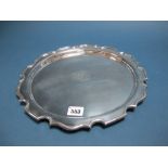 A Hallmarked Silver Salver, CB&S, Sheffield 1910, of shaped circular form, initialled to the centre,