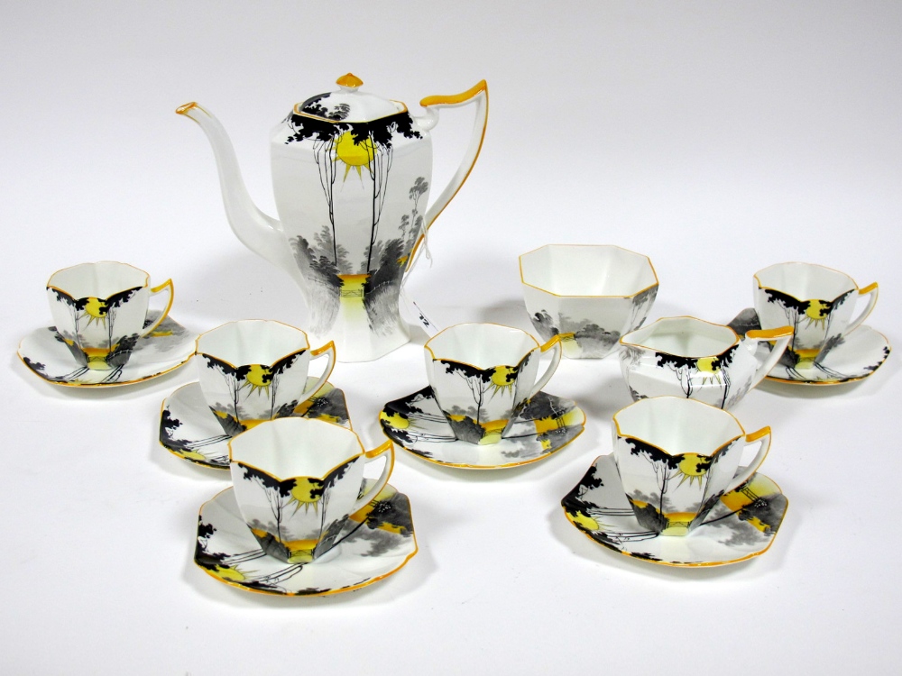 A 1930's Shelley Porcelain Coffee Service in the "Sunset and Tall Trees" Pattern, in black and