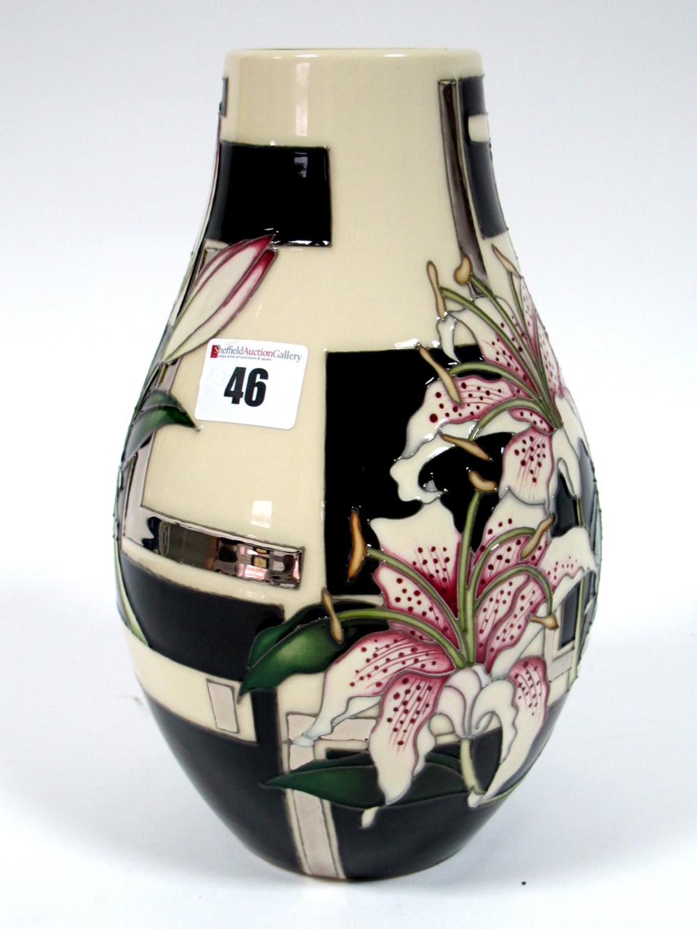 A Moorcroft Pottery Vase, of pear shape form, painted in the 'Trial' Stargazer pattern, designed