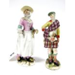 A Chelsea Style Porcelain Figure, modelled as a Scottish gentleman upon a floral encrusted