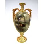 A Royal Worcester Porcelain Vase, of two handled ovoid footed form, the central panel painted by