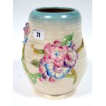 A Clarice Cliff Newport Pottery Vase, of ribbed ovoid form, moulded with pink, purple and blue