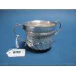 A Hallmarked Silver Porringer, (makers mark incomplete) London 1904, of spirally reeded form, with