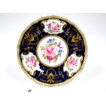 A Royal Crown Derby Porcelain Plate, painted in panels with sprays of summer flowers within a gilt