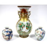 A Late XIX Century Japanese Two-Handled Vase, of baluster form with spreading neck, painted in