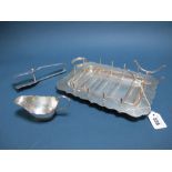 A Hallmarked Silver Asparagus Dish, GLtd, Sheffield 1941, complete with matching sauce boat and