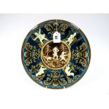 An Early XX Century Austrian Majolica Pottery Dish, of circular form, moulded in relief with