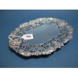 A Decorative Hallmarked Silver Dish, Walker & Hall, Sheffield 1937, of shaped oval form, the wide