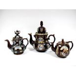 A Mid XIX Century Barge Ware Teapot and Cover, with teapot finial, applied with flowers and