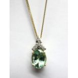 An 18ct Gold Paraiba Tourmaline Single Stone Pendant, oval four claw set, below brilliant cut