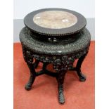 A Late XIX Century Chinese Hardwood Jardinére Stand, the circular top with beadwork decoration,