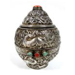 A Chinese Lidded Pot, (possibly resin lined) allover detailed in relief with sinuous dragons and