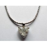 An 18ct White Gold Single Stone Heart Shape Diamond Pendant, on 18ct white gold fancy link chain,