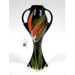 A Moorcroft Pottery Twin Handled Vase, painted in the Paradise Found pattern, designed by Vicky