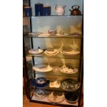 A quantity of Victorian and later plates and platters, together with storage jars,