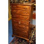 A mahogany tallboy chest on chest, with three short drawers over four graduated drawers,