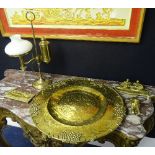 A brass rise and fall table lamp, 54cm high, also with brass inkwell, brass letter opener on stand,
