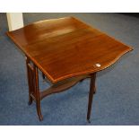 An Edwardian mahogany inlaid Sutherland table, decorated with inlaid satinwood crossbanding,