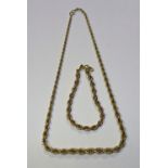A 9ct gold twist link necklace, of graduated form, stamped 9ct to clasp, 11.