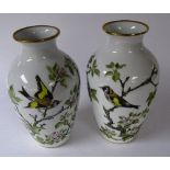 A pair of Franklyn porcelain 'Woodland Birds' vases,