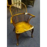 An 18th century ash and fruitwood Windsor chair,